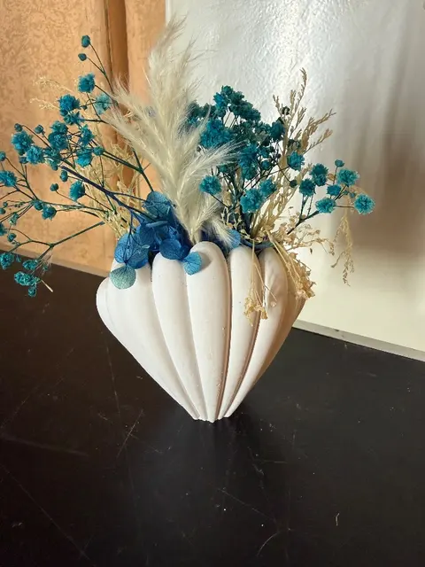 Muschel mit Blumen