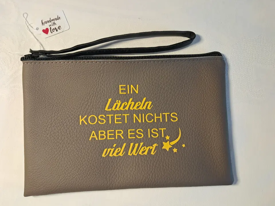 Handgelenktasche mit inspirierendem Spruch – Matthias Drwenski